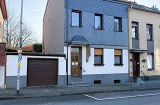 Einfamilienhaus kaufen in 52146 Würselen, Zentral gelegenes Einfamilienhaus mit Wintergarten,Garten,Garage und Entwicklungspotential