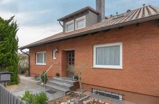 Einfamilienhaus kaufen in 64546 Mörfelden-Walldorf, Familienidylle in ruhiger Lage – Großzügiges Einfamilienhaus mit Süd-West Terrasse und Garage
