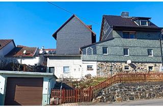 Einfamilienhaus kaufen in 63679 Schotten, Schotten - Natuschieferhaus mit Garten und Garage