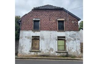 Einfamilienhaus kaufen in 41836 Hückelhoven, Hückelhoven - Sanierungsobjekt mit großem Grundstück, Scheune & Garagen!