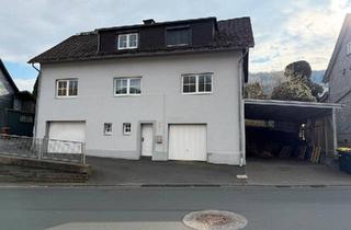 Haus kaufen in 35716 Dietzhölztal, Dietzhölztal - Zweifamilienhaus mit viel Platz, Garten und Carport