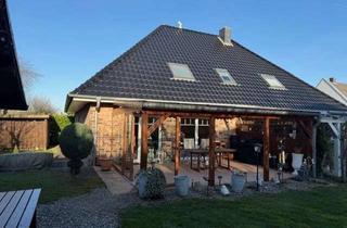 Wohnung kaufen in 23858 Wesenberg, Neuwertige Eigentumswohnung mit Garage und Gartengrundstück