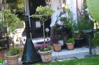 Wohnung kaufen in 51469 Bergisch Gladbach, Gartenwohnung in modernem Architektenhaus in Bensberg als Kapitalanlage