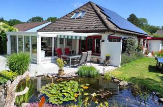 Haus kaufen in 24939 Nordstadt, Bungalow, FL-OSTSEEBAD, 900 m² Grund mit kl. Teich, ca. 165 m² Wfl./Nfl., PV-Anlage, Doppel-Carport