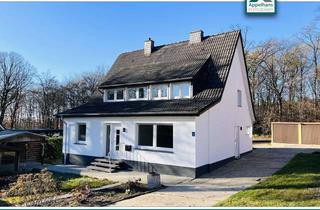 Haus kaufen in 49479 Ibbenbüren, 894 m² Grundstück + 4 Garagen – renoviertes Familienhaus in Grünlage