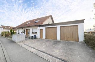 Haus kaufen in 97493 Bergrheinfeld, Attraktives Zweifamilienhaus mit Einliegerwohnung & Gartenparadies!