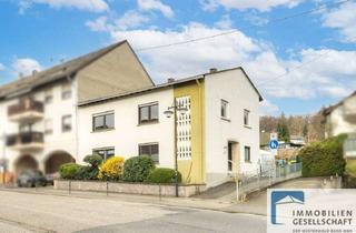 Haus kaufen in 56204 Hillscheid, Vollvermietetes Zweifamilienhaus