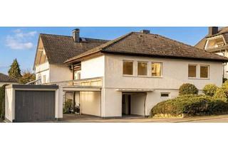 Haus kaufen in 61250 Usingen, Lichtdurchfluteter Bungalow mit Weitblick in Bestlage von Usingen