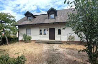 Haus kaufen in 96148 Baunach, Großzügiges Zweifamilienhaus mit ca. 1.720 m² Grundstück und viel Potenzial