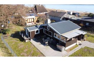 Haus kaufen in 24369 Waabs, Ruhige Lage nahe Ostseestrand: Saniertes Ferienhaus mit Kaminofen & großzügigen Terrassen