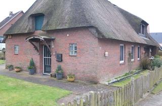 Doppelhaushälfte kaufen in 24340 Goosefeld, Wohnen unter Reet: Kleine Reetdach-Doppelhaushälfte im alten Dorfkern von Goosefeld