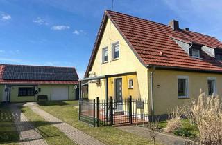 Doppelhaushälfte kaufen in 19339 Plattenburg, Stilvoll modernisierte Doppelhaushälfte am Ortsrand mit viel Platz im Grünen