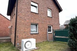 Einfamilienhaus kaufen in 33442 Herzebrock-Clarholz, Freistehendes Einfamilienhaus mit Garten, Wärmepumpe und Ausbaupotenzial in Herzebrock-Clarholz