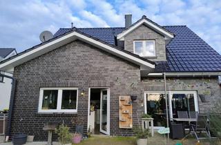 Haus kaufen in 49767 Twist, junge, hochwertige Immobilie mit Doppelgarage im Grünen