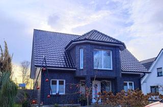 Haus kaufen in 49767 Twist, junge, hochwertige Immobilie mit Doppelgarage im Grünen