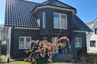 Haus kaufen in 49767 Twist, junge, hochwertige Immobilie mit Doppelgarage im Grünen