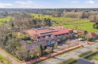 Gewerbeimmobilie kaufen in 26524 Berumbur, Attraktive Gewerbeimmobilie mit Büro, Hallen, Ladenfläche und vermietetem Einfamilienhaus in Berumbur!
