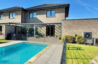 Doppelhaushälfte kaufen in 41379 Brüggen, Brüggen - Exklusive Doppelhaushälfte mit Wintergarten, Pool und Wärmepumpe in Brüggen