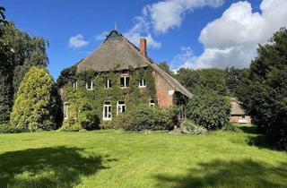 Haus kaufen in 27628 Hagen, Hagen - Großzügiges Anwesen unter Reet mit großem parkähnlichem Grundstück - vielseitig nutzbar.