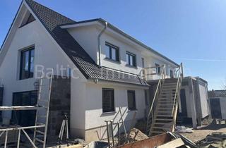 Wohnung kaufen in 23730 Neustadt, Komplett in 2025/26 sanierte helle Souterrainwohnung mit 2 Terrassen !