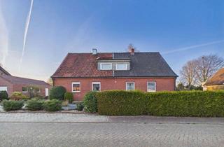 Doppelhaushälfte kaufen in 49828 Neuenhaus, Doppelhaushälfte mit großem Grundstück und Entwicklungspotenzial