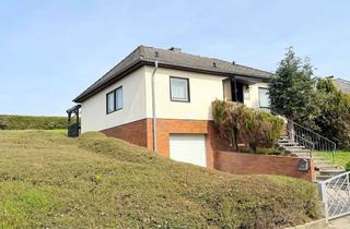 Haus kaufen in 56355 Nastätten, Unterkellerter Bungalow in guter Wohnlage von Nastätten