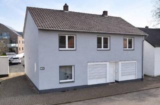 Haus kaufen in 46459 Rees, Vielseitig nutzbares Ein-/Zweifamilienhaus in Rees mit Garage und großem Hof