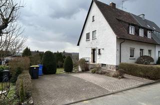 Doppelhaushälfte kaufen in 34414 Warburg, Solide Doppelhaushälfte mit großzügigem Garten und Entwicklungspotenzial in ruhiger Lage von Warburg