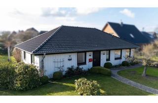 Haus kaufen in 25866 Mildstedt, Attraktiver Bungalow mit Südwest-Terrasse, Garage und großem Grundstück