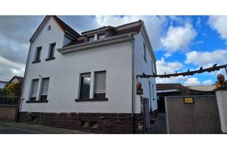 Einfamilienhaus kaufen in 55435 Gau-Algesheim, 1463 Freistehendes Einfamilienhaus im Zentrum von Gau-Algesheim