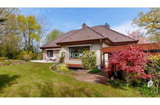 Haus kaufen in 24576 Hitzhusen, Unglaublich schön! Bungalow auf 7300m² großem Grundstück in Waldrandlage und Teich