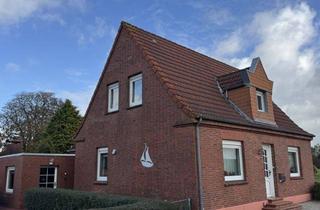 Einfamilienhaus kaufen in 26802 Moormerland, Direkte Aussicht auf Deich und Ems! Renovierungsbedürftiges Einfamilienhaus mit Garage & Nebengebäude in ruhiger Sackgassenlage