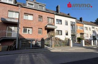 Anlageobjekt in 52134 Herzogenrath, Solides Dreifamilienhaus mit intergrierter Garage im Ortszentrum