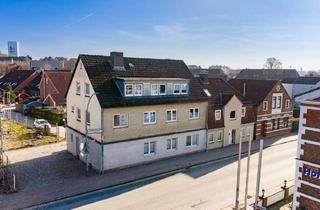 Anlageobjekt in 23730 Neustadt, Hafenquartier-Chance: MFH mit 5 Einheiten und 2 Garagen – Bahnhof fußläufig