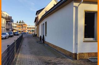 Gewerbeimmobilie kaufen in 33803 Steinhagen, Repräsentative Gewerbeimmobilie in zentraler Lage von Steinhagen - Praxis, Büro, Handel, mit Lager!