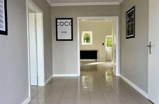 Wohnung kaufen in 31542 Bad Nenndorf, Stillvoll renovierte Erdgeschosswohnung mit großem Garten in idyllischer Feldrandlage!