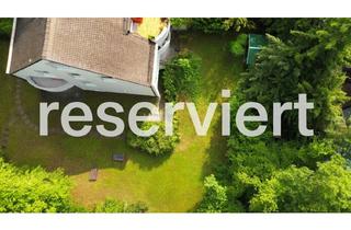 Wohnung kaufen in 82031 Grünwald, RESERVIERT: Gartenwohnung mit viel Licht & Raumgefühl – Wohnen auf zwei Ebenen mit Einliegerwohnung