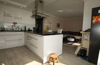 Wohnung kaufen in 91438 Bad Windsheim, Sanierte 3,5-Zimmer Erdgeschosswohnung mit Garten