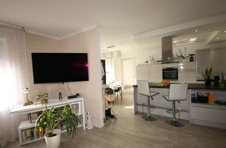 Wohnung kaufen in 91438 Bad Windsheim, Moderne 3,5-Zimmer Erdgeschosswohnung mit großem Garten