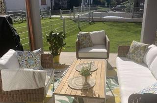 Wohnung kaufen in 83026 Aising, Erdgeschosswohnung mit Garten und Bergblick