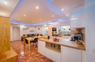 Wohnung kaufen in 69253 Heiligkreuzsteinach, Kernsanierte 4-Zimmer-Souterrain-Wohnung mit Südgarten, Terrasse und separatem Eingang