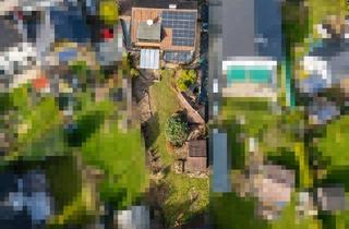 Einfamilienhaus kaufen in 51399 Burscheid, Burscheid: Freistehendes Einfamilienhaus mit Charme und Sonnengrundstück in begehrter Wohnlage