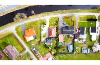 Haus kaufen in 26639 Wiesmoor, Modernisiertes Zweifamilienhaus mit großem Grundstück – ideal für Eigennutzer und Kapitalanleger