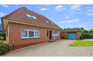 Haus kaufen in 26639 Wiesmoor, Modernisiertes Zweifamilienhaus mit großem Grundstück – ideal für Eigennutzer und Kapitalanleger