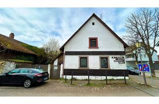 Haus kaufen in 76287 Rheinstetten, Bestandsimmobilie mit Innenhof und separatem Nebengebäude