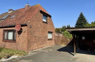 Doppelhaushälfte kaufen in 25746 Heide, Verkauf einer Doppelhaushälfte in Heide mit Garten und Doppelcarport