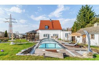 Einfamilienhaus kaufen in 86633 Neuburg, Großzügiges Einfamilienhaus mit weitläufigem Garten, Pool und durchdachter Raumaufteilung