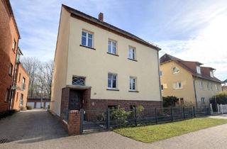 Mehrfamilienhaus kaufen in 14776 Neustadt, Mehrfamilienhaus mit drei Wohnungen, Garten und Doppelgarage – solide Substanz in zentraler Lage