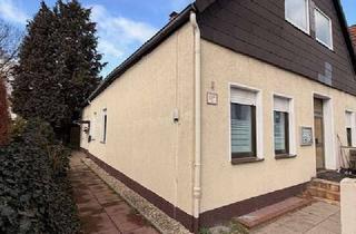 Mehrfamilienhaus kaufen in Ringenbergstraße, 33611 Schildesche, Mehrfamilienhaus mit Zusatzchance: 4 Wohnungen vermietet + Lagerhalle - Ausbaureserve