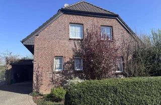 Einfamilienhaus kaufen in 46459 Rees, Gemütliches Einfamilienhaus mit Garage und kleinem Garten